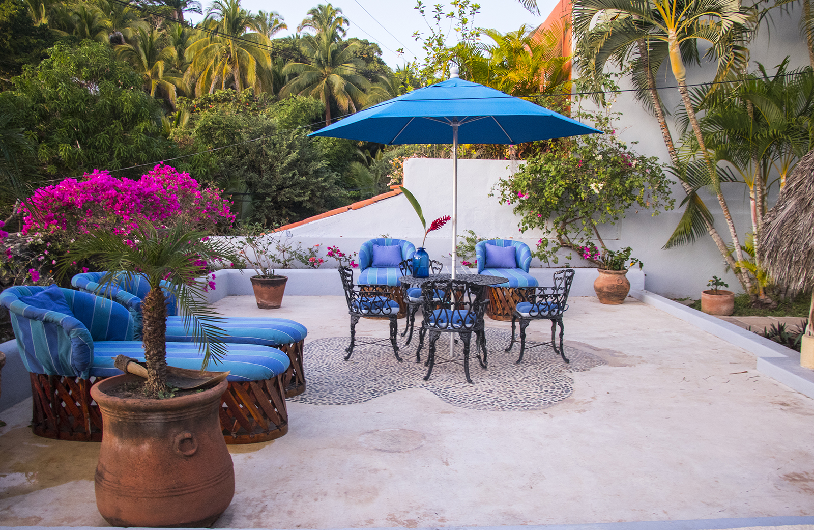 Patio area next to the pool at our stunning vacation rental property in San Pancho, Mexico